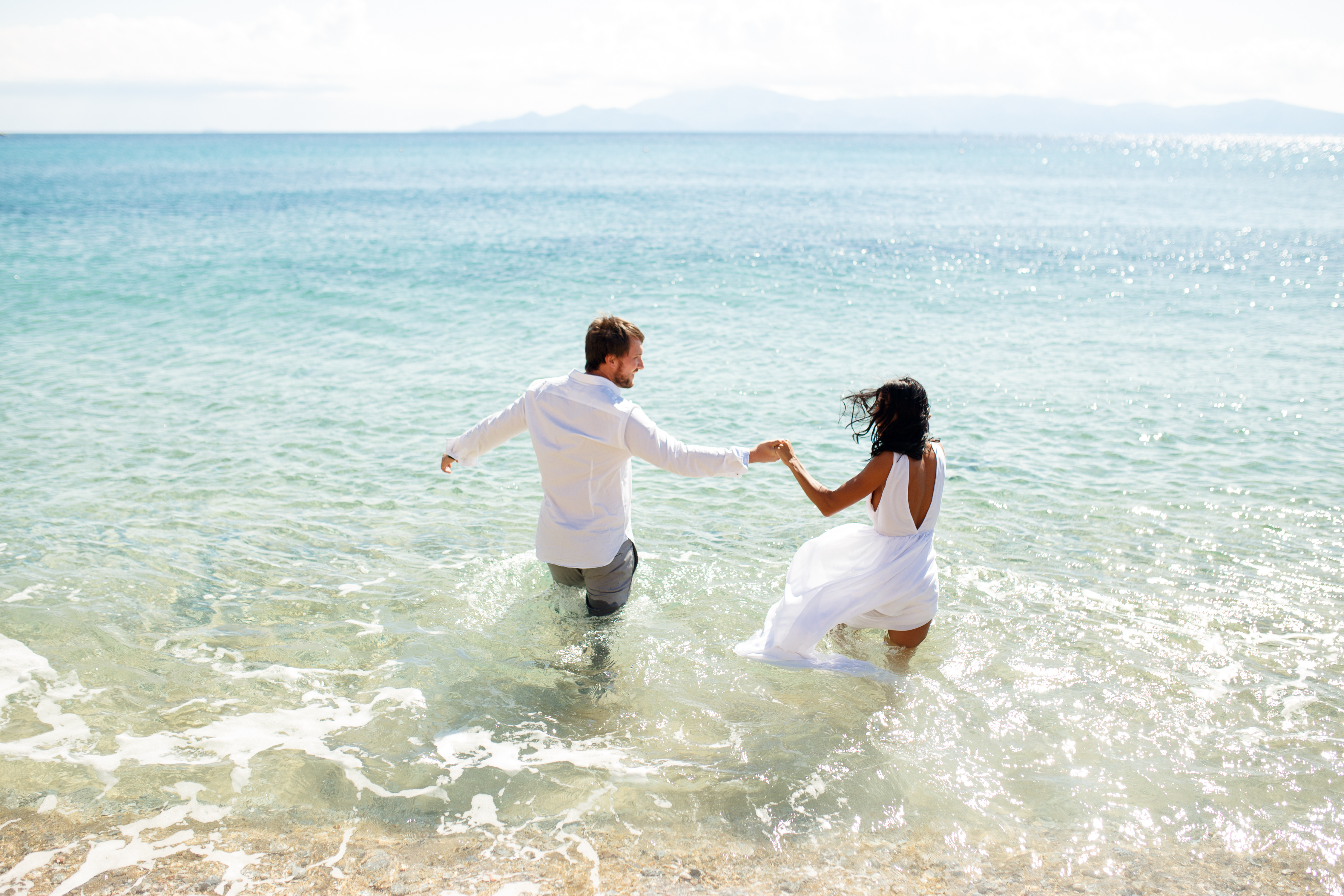 Couple planning their wedding and honeymoon budget