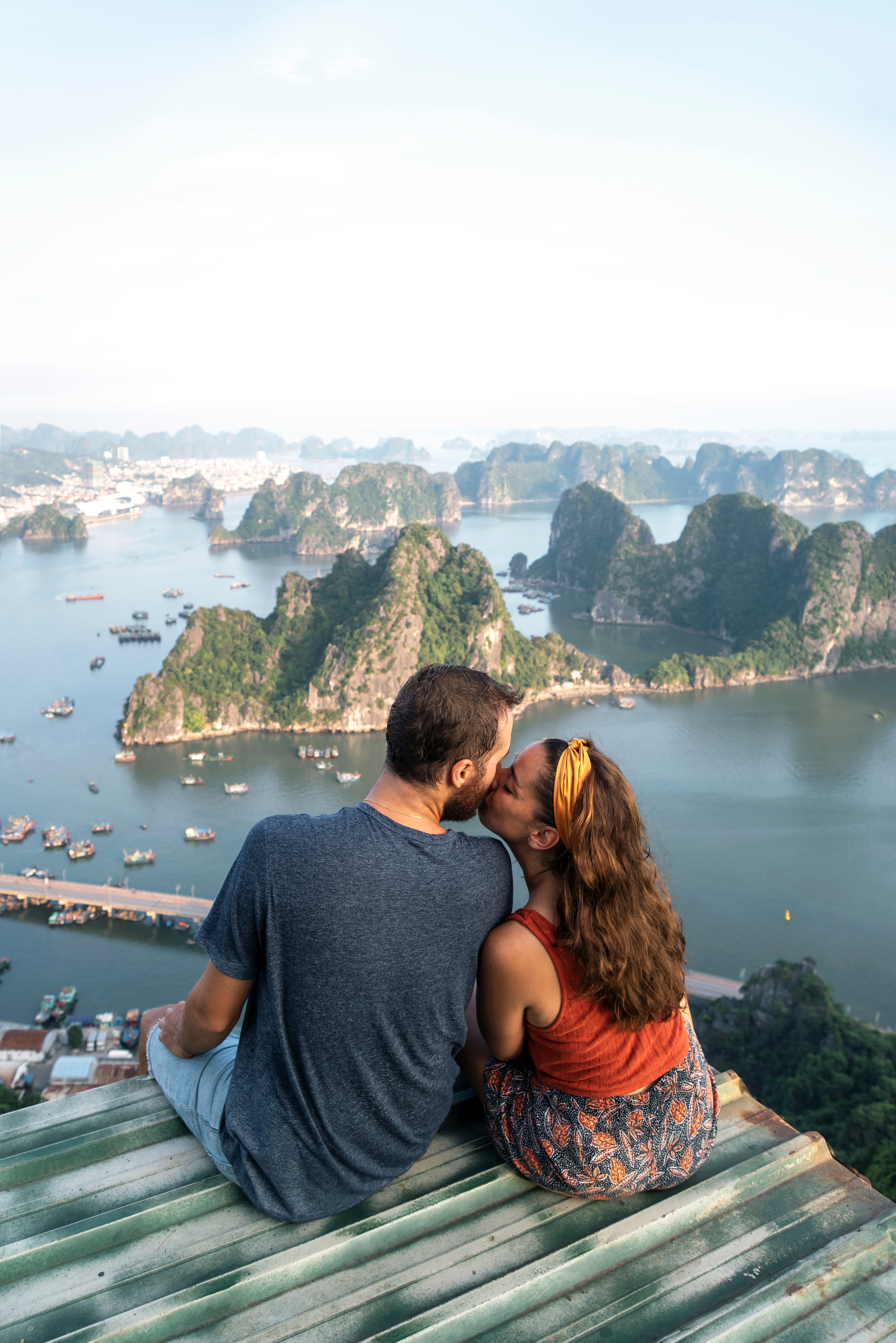 Happy honeymoon couple embracing outdoors