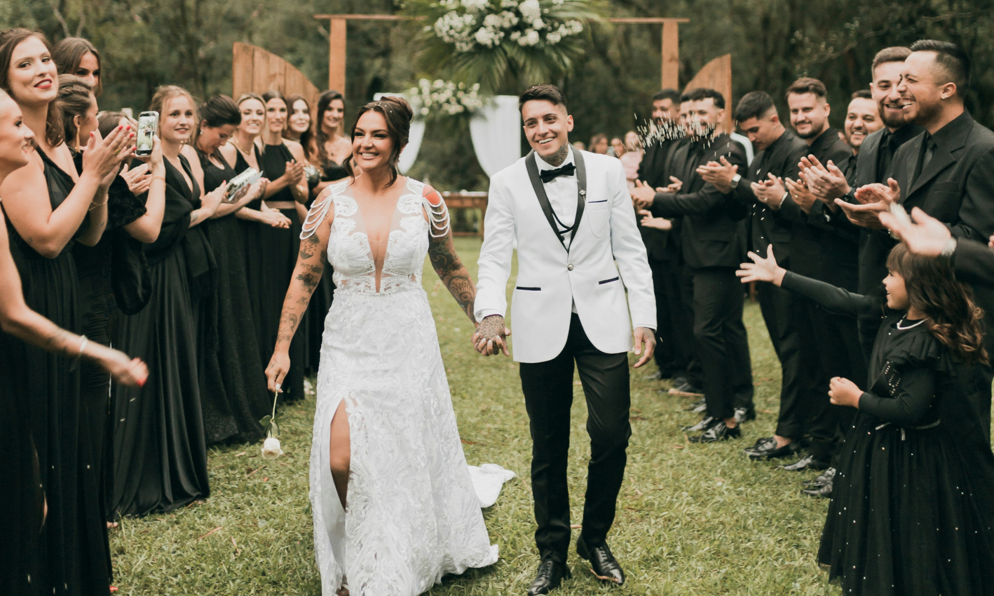Couple with wedding guests